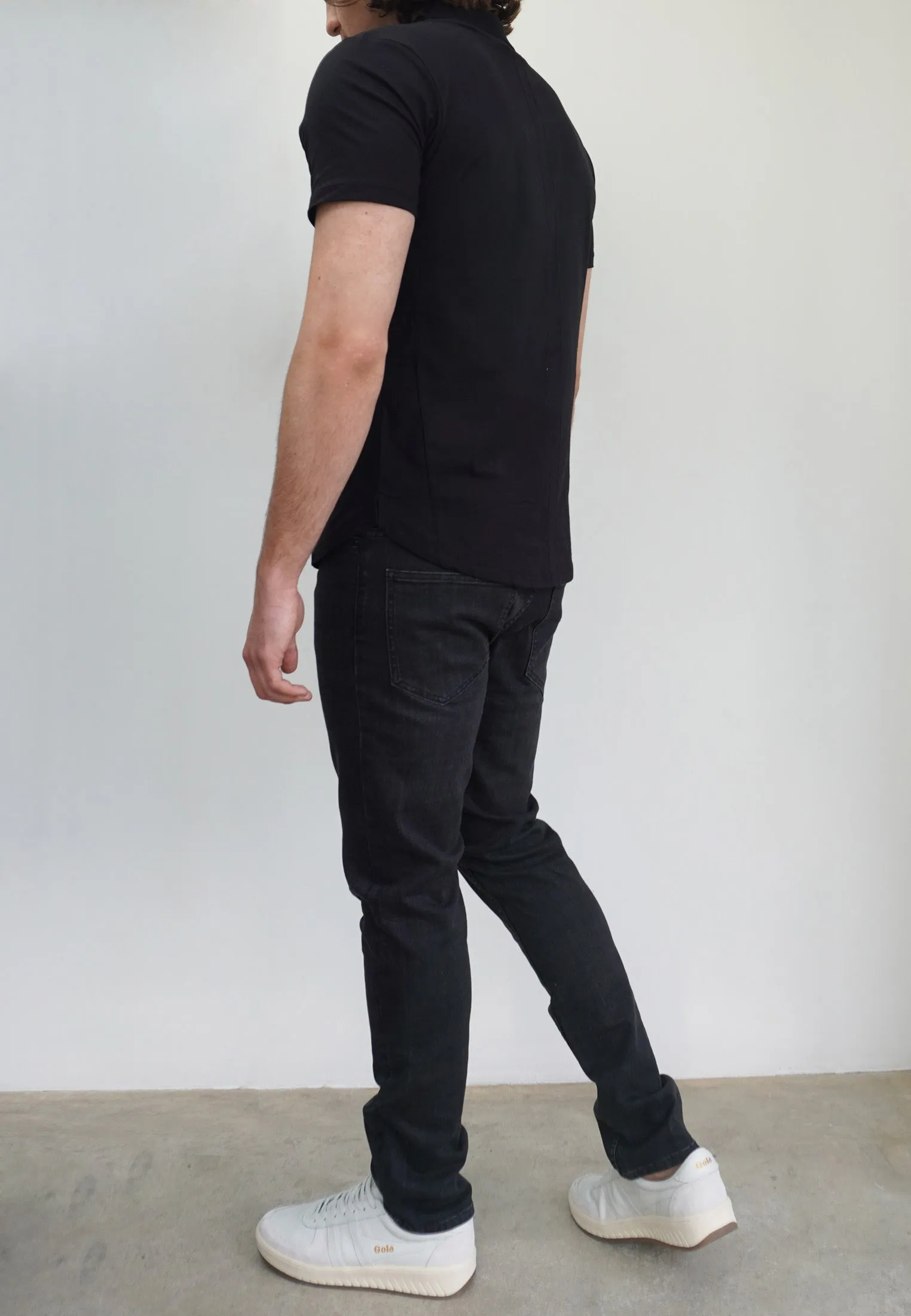 ESSENTIAL CURVED HEM BLACK POLO SHIRT